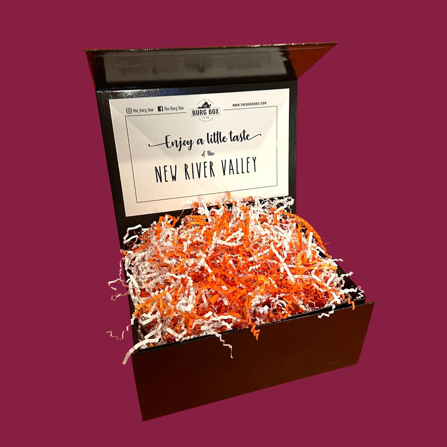 The Burg Box luxe box with maroon background